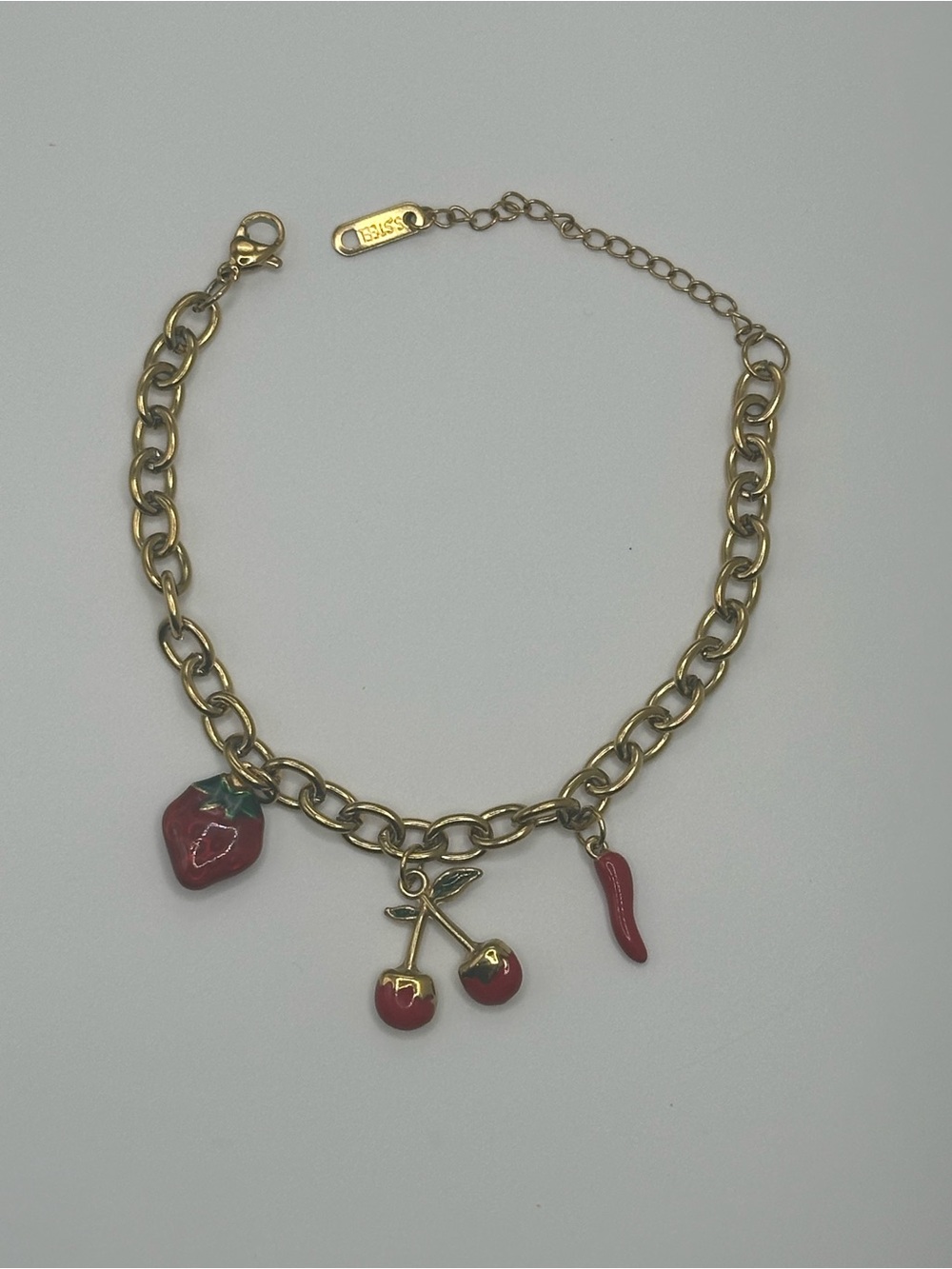 Gold Tone Fruit & Chili Charm Bracelet with Red Enamel Accents
